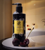 Zenzar Cherry Amour hand soap bottle with cherries on a bathroom counter