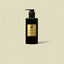 ZENZAR Cherry Amour luxury hand wash in an elegant black bottle with a gold label on a beige background